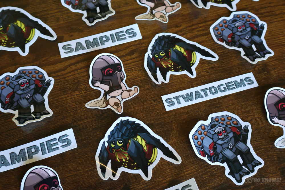 Stickers featuring Chibi baby versions of a helldiver, automaton (rocket devastator), terminid (bile spewer), and two text stickers that say "Stwatogems" and "Sampies."